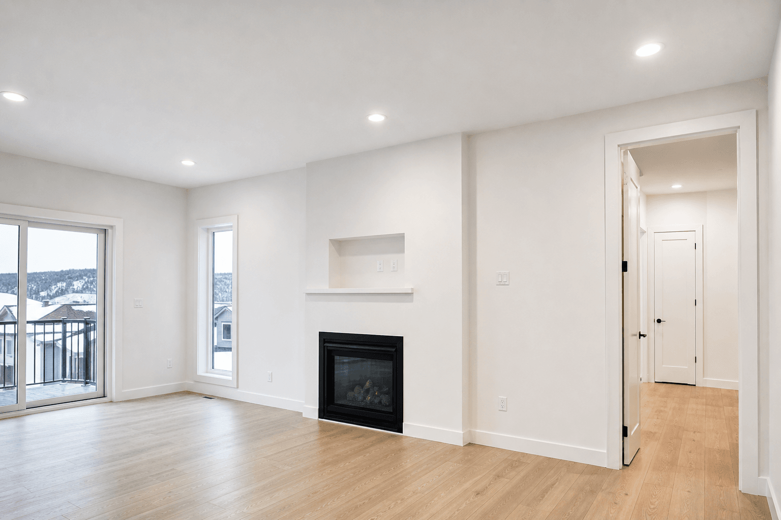 Completed drywall installation in a bright modern living room
